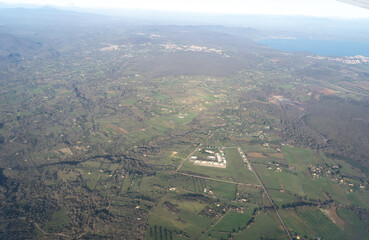Obraz premium Plane Window View, Aircraft Fly Landscape, Looking from Plane Cabin, Plane Window Aerial View