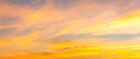 Golden sky the golden orange glow of the sunset. Colorful sky in winter. - obrazy, fototapety, plakaty