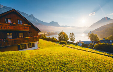 Impressive views of the morning garden in sunlight. Archkogl, Grundlsee, Austria. - obrazy, fototapety, plakaty
