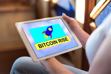 Bitcoin rise concept on a tablet