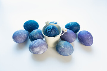 Space colored eggs on white background.