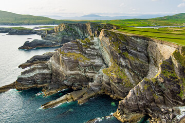 Fototapeta premium Kerry Cliffs, widely accepted as the most spectacular cliffs in County Kerry, Ireland. Tourist attractions on famous Ring of Kerry route.