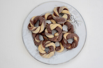 Biscuit cookies assortment on a white background, top view
