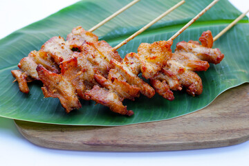 Fried pork on skewers. Delicious food