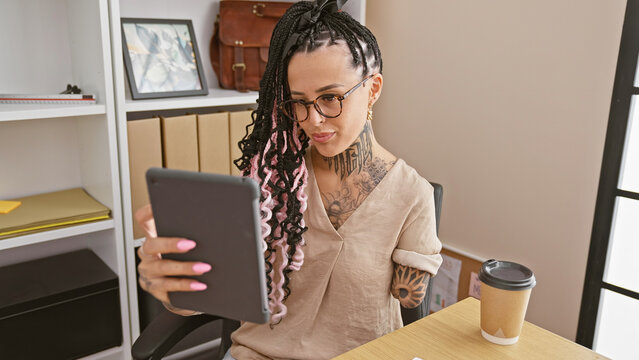 Hispanic amputee worker embracing success, business woman rocking tech, handicap be damned!