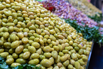 Pickled Olives Pile, Fermented Olives, Marinated Mediterranean Snack, large piles of Olive Pickles