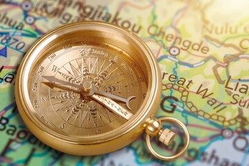 Magnetic old retro compass on map background