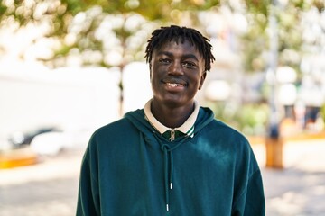 African american man smiling confident standing at park