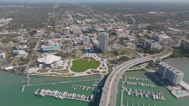 High aerial view of downtown Clearwater, Florida panning around to Intracoastal water view