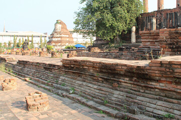 ruined temple (wat thammikarat) in ayutthaya in thailand 