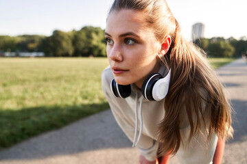 Young woman during jogging in the park