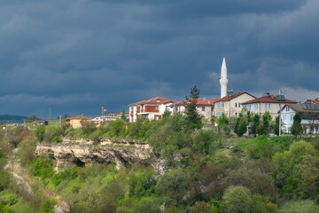 Obraz premium Traditional Ottoman Houses and mosques and Turkish baths in Safranbolu. Safranbolu is a UNESCO World Heritage Site. Old wooden mansions Turkish architecture. Safranbolu view.