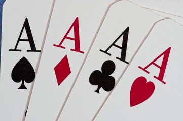 Playing cards with four aces