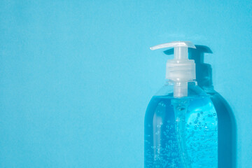 Hand sanitizer in a bottle on a bright background. Coronavirus prevention concept.