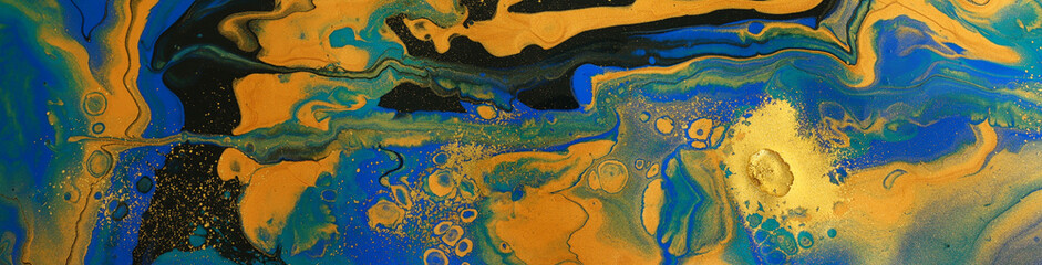 art photography of abstract marbleized effect background with blue, black and yellow creative colors. Beautiful paint.