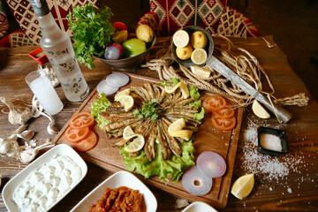 Fototapeta na wymiar Wooden Table With Assorted Bowls of Food