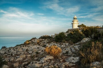 Fototapeta na wymiar view of the Cap de Sant Antoni Lighthouse in Alicante Province in warm evening light