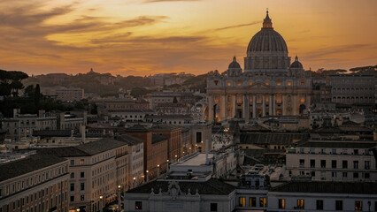 Fototapeta na wymiar Iconic Saint Peter's Basilica in Vatican City glowing in the warm sunset light
