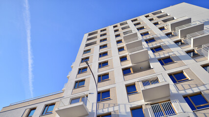 Fototapeta na wymiar Modern architecture of urban residential apartment building. Apartment building exterior, residential house facade.