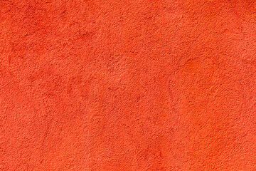 background of red painted plaster wall