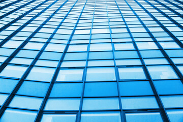 Blue glass background. Office block texture. Glass skyscraper background. Glass window building....