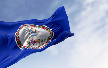 Virginia state flag waving in the wind on a clear day