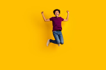 Full length photo of positive crazy guy wear stylish clothes celebrate success victory lottery jackpot isolated on yellow color background