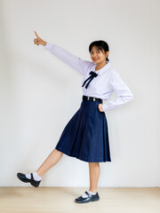 Happy student young girl on white background.;