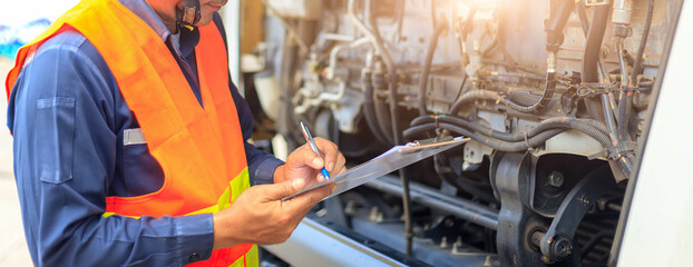 Preforming a pre-trip inspection on a truck,Concept preventive maintenance truck checklist,Check...