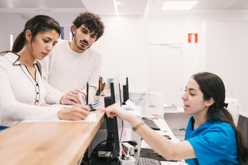 Patient registration at modern medical clinic