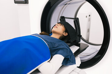 Patient undergoing a scan in a modern MRI machine