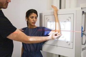 Patient undergoing a digital wrist x-ray examination
