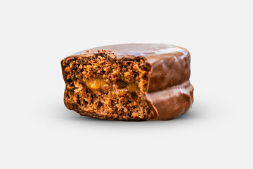 bitten pão de mel or english honey bread isolated on a white background