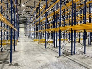warehouse or storage with empty shelves, industrial distribution warehouse interior