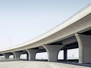 a highway overpass with a city in the background