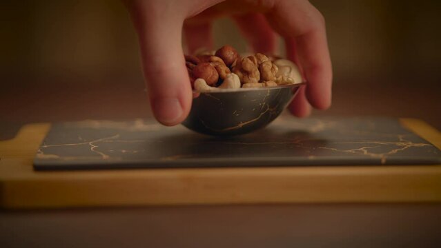 Mixed Nuts of Almonds Pecan Walnuts Cashews Hazelnuts on Wooden Table