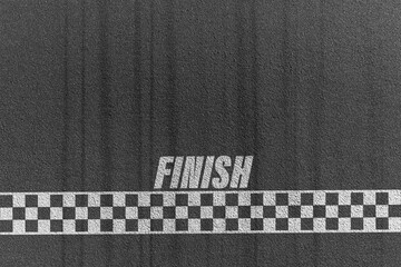 Finish line racing background top view,Textured asphalt with finishing line.