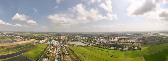 Panoramic drone images of rice fields, villages and the capital.