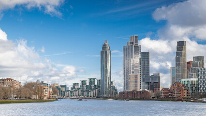 London skyline with white clouds and blue sky