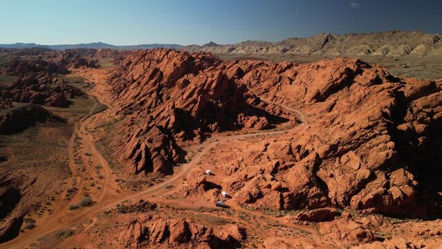 High aerial of RVs camping in beautiful red Moapa Valley Nevada desert near Valley of Fire State Park