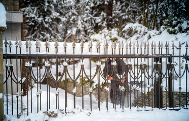 worker throwing snow