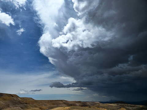 The calm and the storm in the same photo, with clear skies and approaching storm clouds.