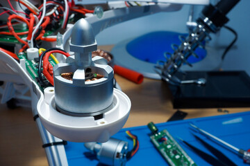 Close-up of repair and assembly of UAV quadcopter.