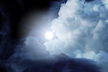 Night sky with bright light. clouds in mystic sky