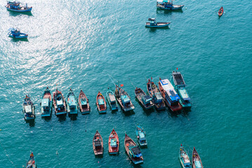 Small fishing boats anchored on the sea
