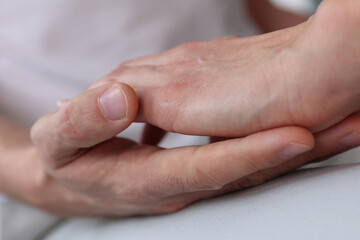 Reiki energy healing. Man and woman Holding hands close up. Couple Yoga and Meditation concept