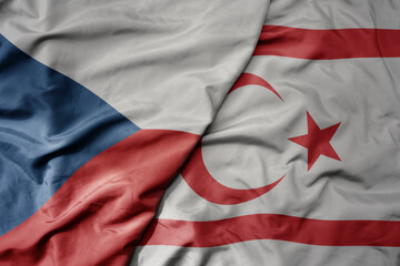 big waving national colorful flag of northern cyprus and national flag of czech republic.