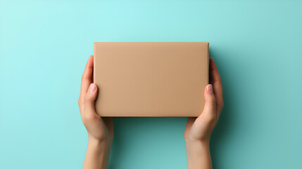 Mockup. Female hand holding brown rectangular cardboard box on blue background, generative ai