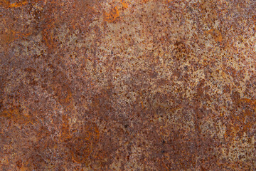 Metal rust, orange color on metal plate use as background	