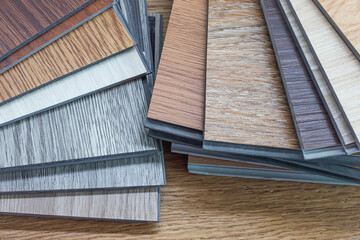 Examples of ready-made vinyl flooring for interior work.